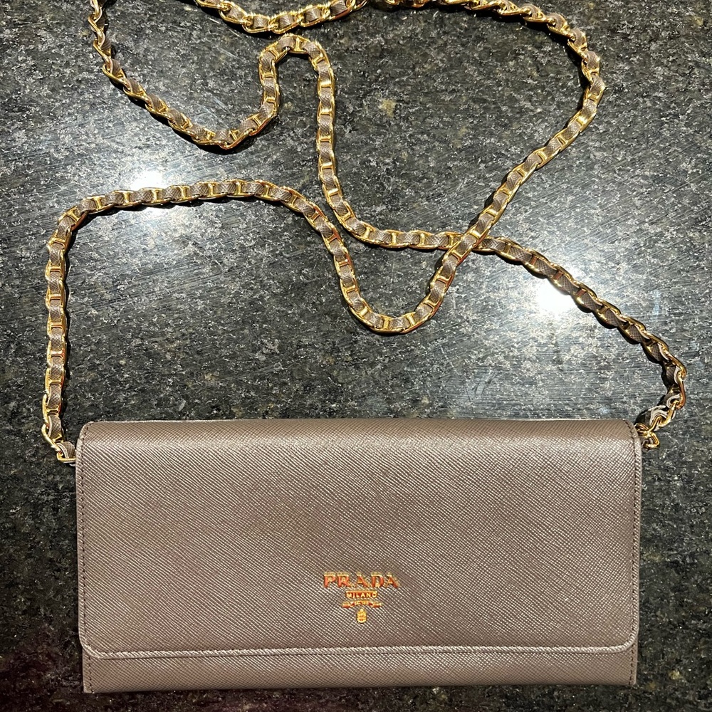 PRADA wallet in chain - original grey. Comes with certificate of authenticity.